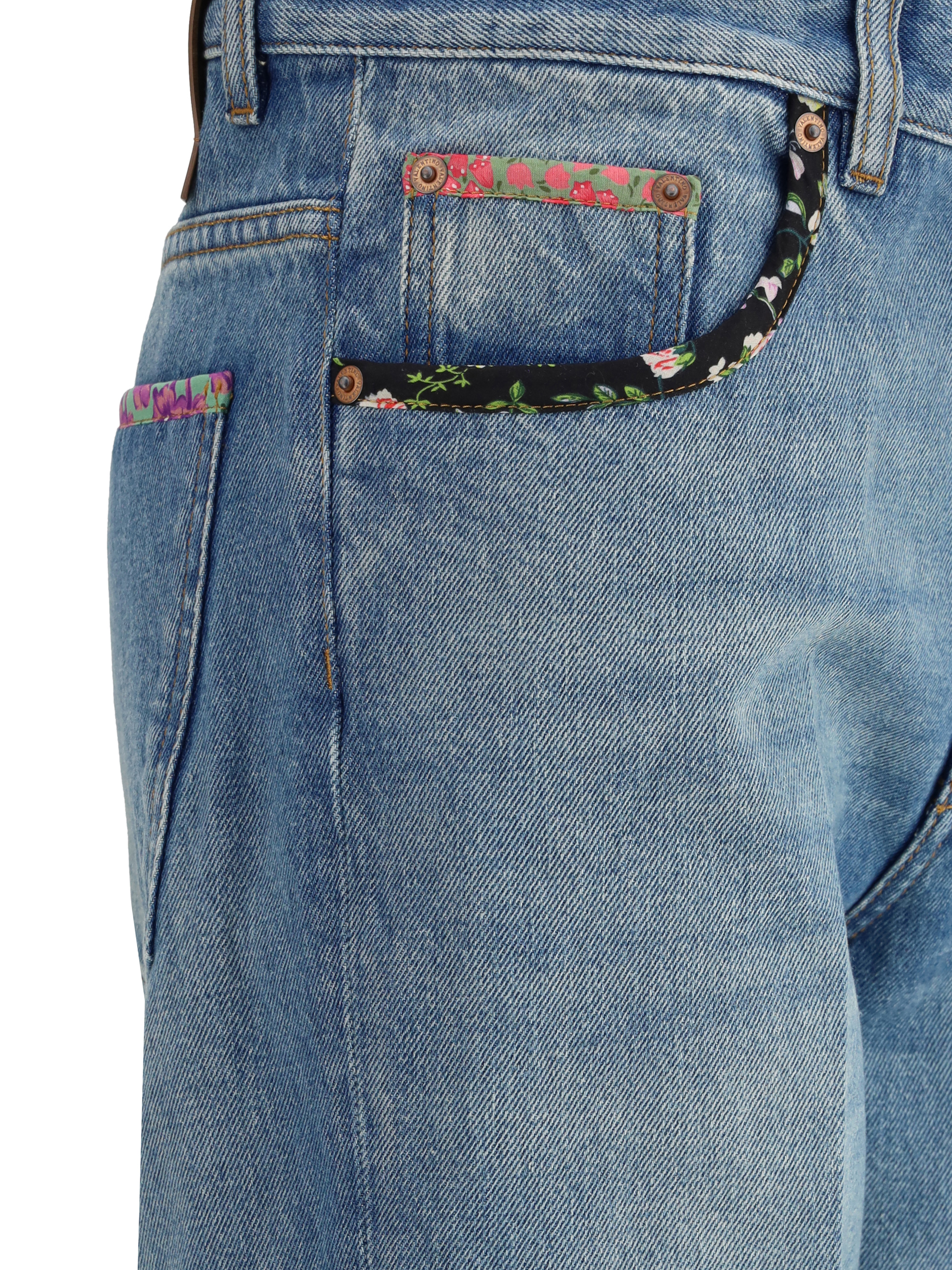 Jeans con dettagli floreali